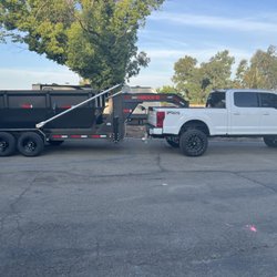 Wilder Dumpster Rentals - Truck trailer and dumpster bin