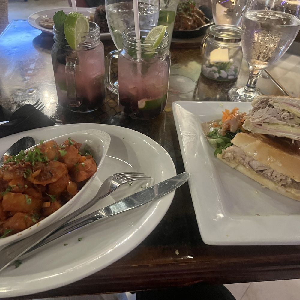 Bella Cuba - Traditional Cuban Sandwich and Papitas Bravas with a Blueberry Mojito - Cuban Near Me - Miami Beach, Florida Bella Cuba - Traditional Cuban Sandwich and Papitas Bravas with a Blueberry Mojito - Cuban Near Me - Miami Beach, Florida