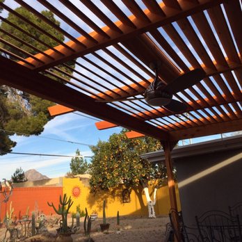 Cornerstone - a view of a patio with a pergolated roof - General Contractors Near Me