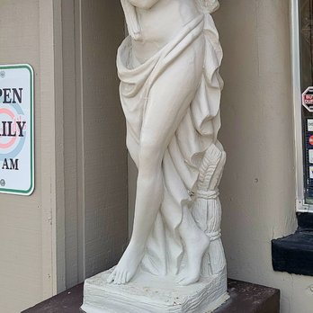Joe Boccardi's Ristorante - a statue of a woman holding a basket - Pizza Near Me - Eureka, Missouri