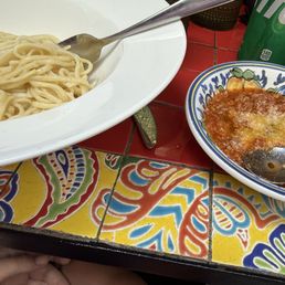 Kid's pasta with meat sauce on side. Kid's pasta with meat sauce on side.
