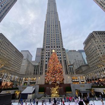 Rockefeller Center - 2023 Rockefeller Center Christmas Tree with the ice skaters - Shopping Centers Near Me - New York, New York Rockefeller Center - 2023 Rockefeller Center Christmas Tree with the ice skaters - Shopping Centers Near Me - New York, New York