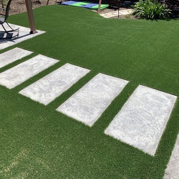 AAA Total Landscape - a lawn with stepping stones - Landscaping Near Me - Visalia, California