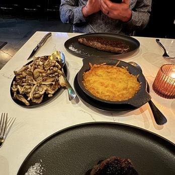 Porterhouse - Wagyu New York Steak and Wagyu Filet with Pan Roasted Mushrooms and Cheesy Potatoes. - Steakhouses Near Me - El Segundo, California Porterhouse - Wagyu New York Steak and Wagyu Filet with Pan Roasted Mushrooms and Cheesy Potatoes. - Steakhouses Near Me - El Segundo, California