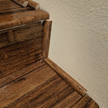 702 Services - Lincoln Log stair trim - Handyman Near Me
