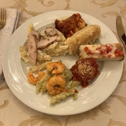 a plate of food on a table a plate of food on a table