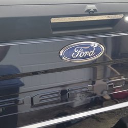 Lacey Collision Center - Wrong part, notice it's blue not black and chrome... this is after tailgate was taken off to be repainted.