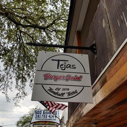 a sign for tejas burger joint a sign for tejas burger joint