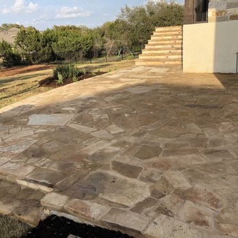 Ol' Yeller Landscaping - patio with a water tank - Landscaping Near Me - Kyle, Texas Ol' Yeller Landscaping - patio with a water tank - Landscaping Near Me - Kyle, Texas