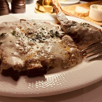 Rao's Miami Beach - Veal Chop Parmigiana - Italian Near Me - Miami Beach, Florida Rao's Miami Beach - Veal Chop Parmigiana - Italian Near Me - Miami Beach, Florida