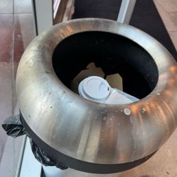 This trash can has not seen a cleanser in ages. This theme continued down the sides as well.