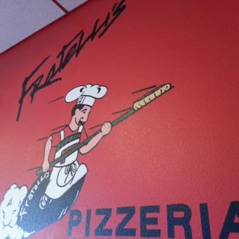 Fratelli's Pizza - a man playing a guitar - Pizza Near Me - Helendale, California