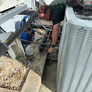 McCombs Electrical Heating & Air - Expert HVAC Tech Chris working on a Commercial condenser in Pensacola, Florida - Electricians Near Me - Milton, Florida McCombs Electrical Heating & Air - Expert HVAC Tech Chris working on a Commercial condenser in Pensacola, Florida - Electricians Near Me - Milton, Florida