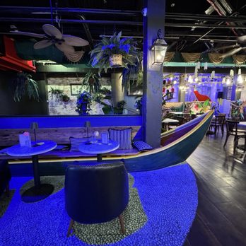 Iberville Cuisine - Whimsical boat table - New American Near Me - New Orleans, Louisiana Iberville Cuisine - Whimsical boat table - New American Near Me - New Orleans, Louisiana