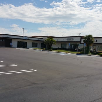 Lopez Bros - the outside of a building and parking lot - General Contractors Near Me - Hesperia, California Lopez Bros - the outside of a building and parking lot - General Contractors Near Me - Hesperia, California