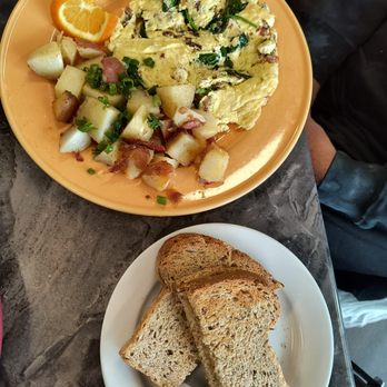 SB Sunshine Cafe - "Sunshine Scramble"
cream cheese, sautéed spinach, and I added bacon. Also pictured are Rosemary potatoes, and rye toast. - Breakfast & Brunch Near Me - Goleta, California SB Sunshine Cafe - "Sunshine Scramble"
cream cheese, sautéed spinach, and I added bacon. Also pictured are Rosemary potatoes, and rye toast. - Breakfast & Brunch Near Me - Goleta, California