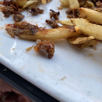 The Fork n Cork - Hair in poutine fries. - New American Near Me - Wilmington, North Carolina The Fork n Cork - Hair in poutine fries. - New American Near Me - Wilmington, North Carolina