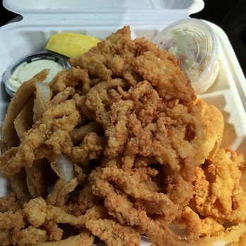 The Lobster Stop - Fried Clam Strips with Onion Rings - Seafood Near Me - Quincy, Massachusetts The Lobster Stop - Fried Clam Strips with Onion Rings - Seafood Near Me - Quincy, Massachusetts