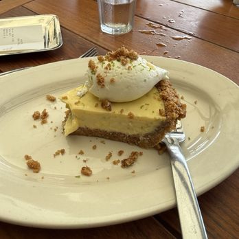 Houston's Restaurant - Key lime pie minus one bite! - American Near Me - Pompano Beach, Florida