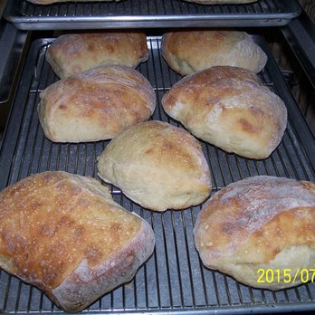 Rein's Real Baking - Garlic Ciabatta, just out of the oven. One of our most popular items - great for dipping or sandwiches. - Bakeries Near Me Rein's Real Baking - Garlic Ciabatta, just out of the oven. One of our most popular items - great for dipping or sandwiches. - Bakeries Near Me
