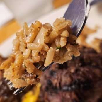 Texas Roadhouse - The seasoned rice on a fork. It tasted so good. - Barbeque Near Me - Roanoke, Virginia Texas Roadhouse - The seasoned rice on a fork. It tasted so good. - Barbeque Near Me - Roanoke, Virginia