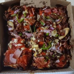 Carlo's Pizza - Carlos's super special personal.  A lot of topping which is great for the price. A little Doughe tasting in the middle.