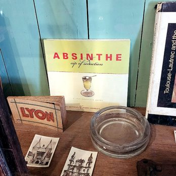 Tante Marie - Many displays in the restaurant. Love absinthe! - Breakfast & Brunch Near Me - Breaux Bridge, Louisiana