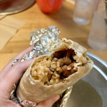 Laughing Planet - The inside of the bean and cheese burrito. - Juice Bars & Smoothies Near Me - Vancouver, Washington Laughing Planet - The inside of the bean and cheese burrito. - Juice Bars & Smoothies Near Me - Vancouver, Washington