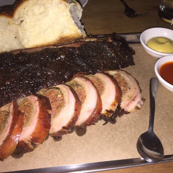 LP's Quality Meats - Two mains from the Smoked Meats menu: lamb belly w sausage stuffing and beef rib - American Near Me - Chippendale, NSW