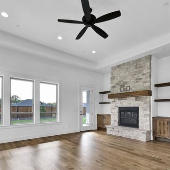 Herman Remodeling - a large empty living room with a fireplace - General Contractors Near Me - San Jose, California Herman Remodeling - a large empty living room with a fireplace - General Contractors Near Me - San Jose, California