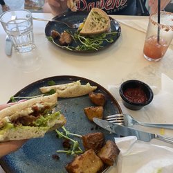 Breakfast sandwich and ham/prosciutto sandwich + a Cesar