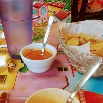 La Justicia - a bowl of soup and a bowl of tortillas - Mexican Near Me - Chicago, Illinois