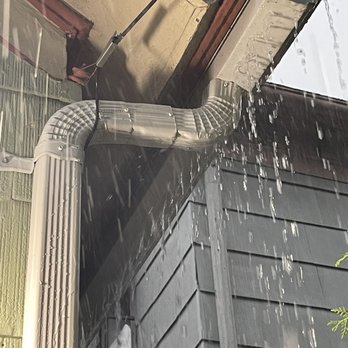 R&k gutters - Rain pouring out of the gutter - Gutter Services Near Me R&k gutters - Rain pouring out of the gutter - Gutter Services Near Me