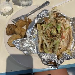 Pita Pocket with chicken side of Greek potatoes Pita Pocket with chicken side of Greek potatoes