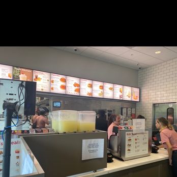 Chick-fil-A - ows a woman ordering food at a fast food restaurant - Fast Food Near Me - Prince Frederick, Maryland