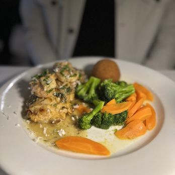 Nona’s Italian Grill - Special: Salmon Almondine with grilled shrimp, vegetables, potato croquette - Italian Near Me - Montgomery, Texas Nona’s Italian Grill - Special: Salmon Almondine with grilled shrimp, vegetables, potato croquette - Italian Near Me - Montgomery, Texas
