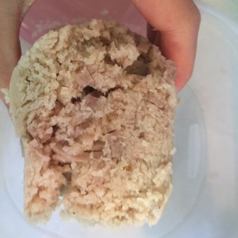Hong Kong Market - a hand holding a piece of rice - Grocery Near Me - Columbia, Missouri Hong Kong Market - a hand holding a piece of rice - Grocery Near Me - Columbia, Missouri