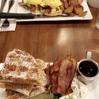 Yolks - Belgian waffles with a side of bacon and 2 poached eggs. - Coffee & Tea Near Me - Vancouver, British Columbia Yolks - Belgian waffles with a side of bacon and 2 poached eggs. - Coffee & Tea Near Me - Vancouver, British Columbia