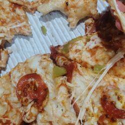 Domino's Pizza - A 2 topping PAN Pizza with no Sauce. Imagine that.