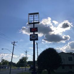 Double Quick - The wind blew out their topmost sign, but at least the fuel price sign is still functioning.