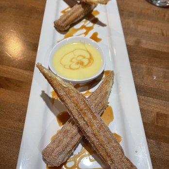 Cocina Madrigal - Bavarian cream filled churros with a creme brûlée dipping sauce - Tacos Near Me - Phoenix, Arizona Cocina Madrigal - Bavarian cream filled churros with a creme brûlée dipping sauce - Tacos Near Me - Phoenix, Arizona