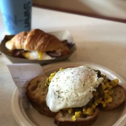 Pop-up toast in the foreground and croissant breakfast sandwich in the back