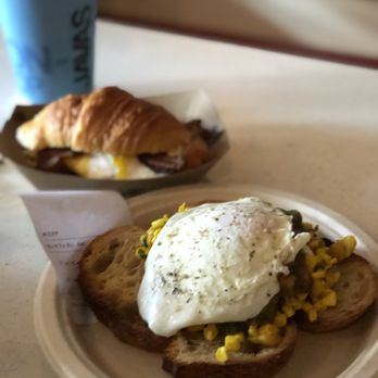 Flour City Bread Company - Pop-up toast in the foreground and croissant breakfast sandwich in the back - Bakeries Near Me - Rochester, New York