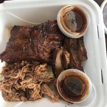 Captain Dan's Steakhouse Barbeque Bar & Grill - Sampler - ribs, pulled pork, and sliced brisket with extra sauce. - Sandwiches Near Me - Brookfield, Missouri Captain Dan's Steakhouse Barbeque Bar & Grill - Sampler - ribs, pulled pork, and sliced brisket with extra sauce. - Sandwiches Near Me - Brookfield, Missouri