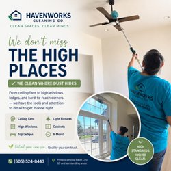 Havenworks Cleaning - We Reach High Places, our team member showing our dusting and window equipment.