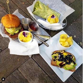 Mara's by Matenaer Catering - Clockwise from Top: Veggie Wrap, Avocado Toast, and Beyond Meat Burger. - Caterers Near Me - Manitowoc, Wisconsin Mara's by Matenaer Catering - Clockwise from Top: Veggie Wrap, Avocado Toast, and Beyond Meat Burger. - Caterers Near Me - Manitowoc, Wisconsin