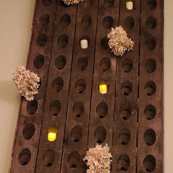 La Fromagerie - Wine bottle holder used for candles and flowers. Very creative. - French Near Me - Alexandria, Virginia La Fromagerie - Wine bottle holder used for candles and flowers. Very creative. - French Near Me - Alexandria, Virginia