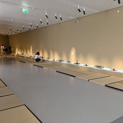 Manggha - 'Suiseki' exhibition. On the first level. You had to take off your shoes. If you don't have socks, borrow some, or go barefoot.