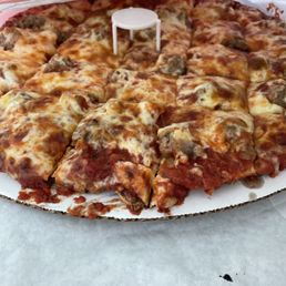 Thin crust sausage pizza with extra sauce...also asked to have the pizza baked a little well done