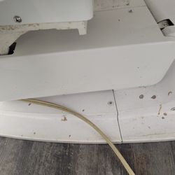 Great Expressions Dental Centers - Rust, corrosion and unidentified material on base of exam chair.